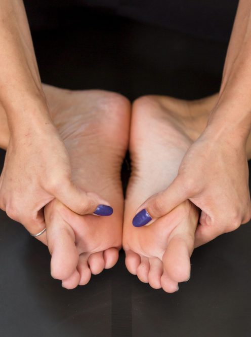 close-up-stretching-feet-sport-home-concept